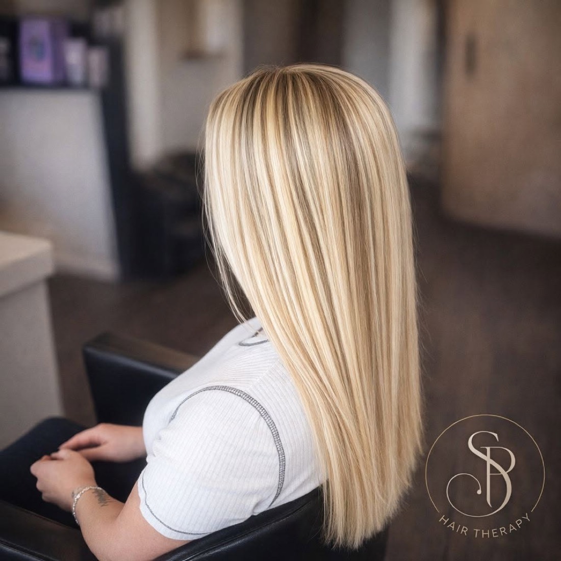 Sleek golden blonde hair, coloured and styled at SP Hair Therapy
